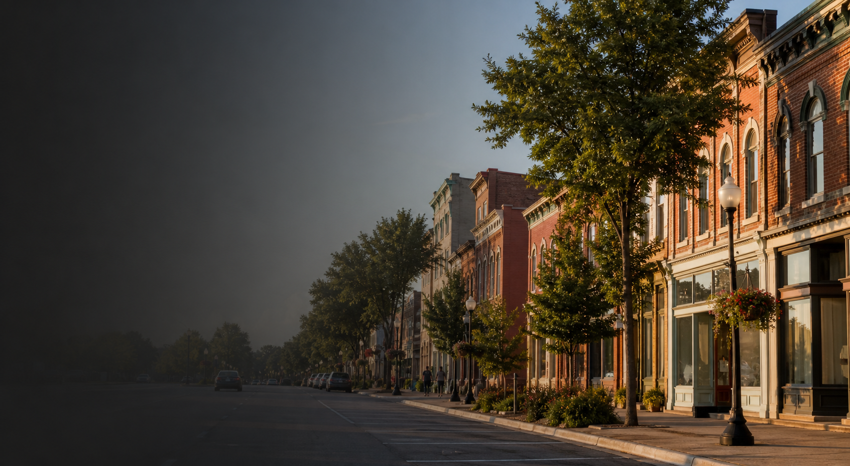 Historic downtown storefronts at sunset